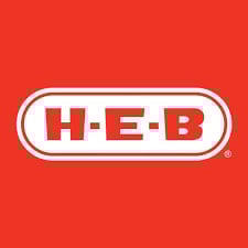 HEB logo - red and white oval badge with H-E-B text on red background